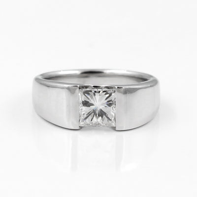 14K White Gold Solitaire Engagement Ring Featuring a Channel Set Princess Cut Moissanite