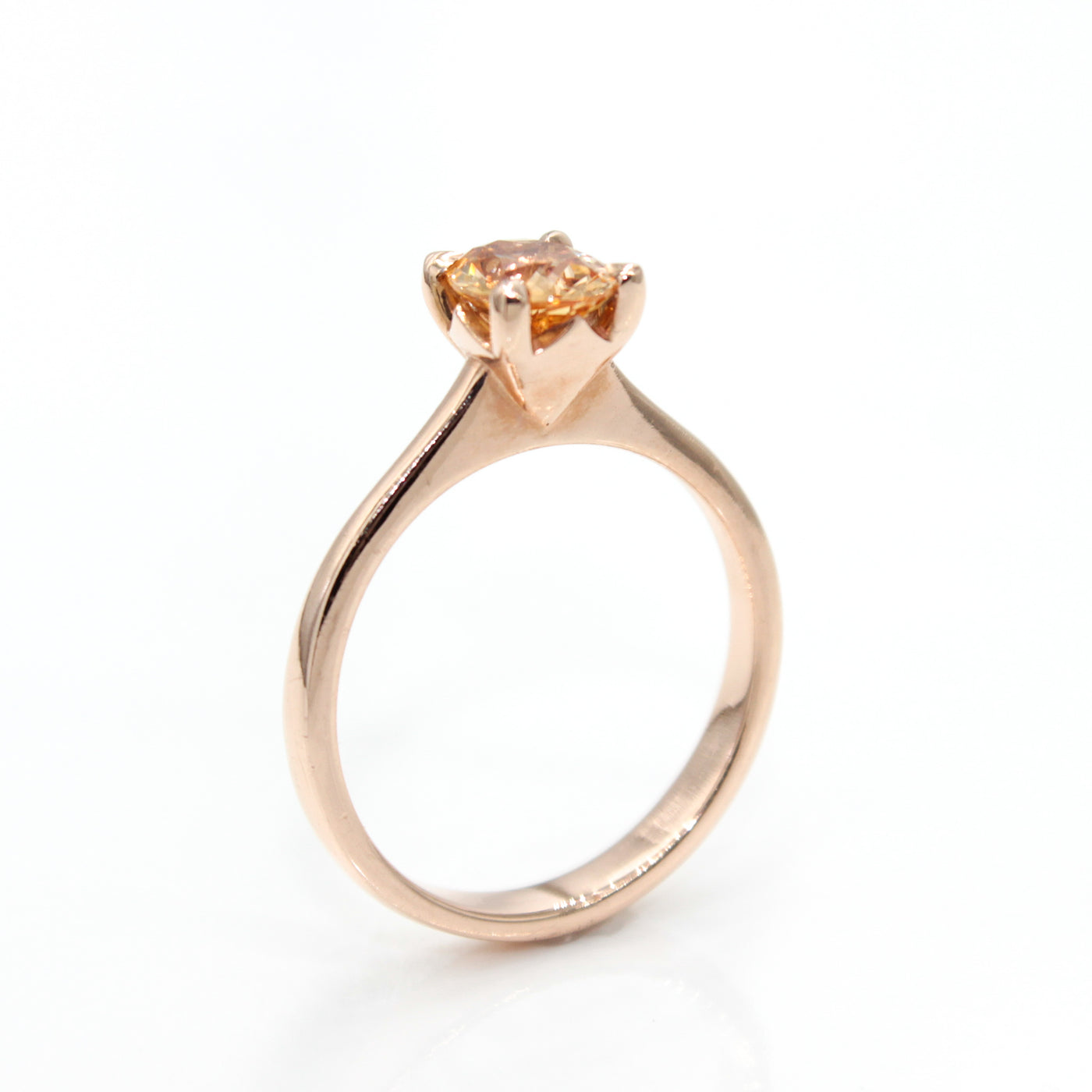 14K Rose Gold Solitaire Ring With Oval Orange Sapphire